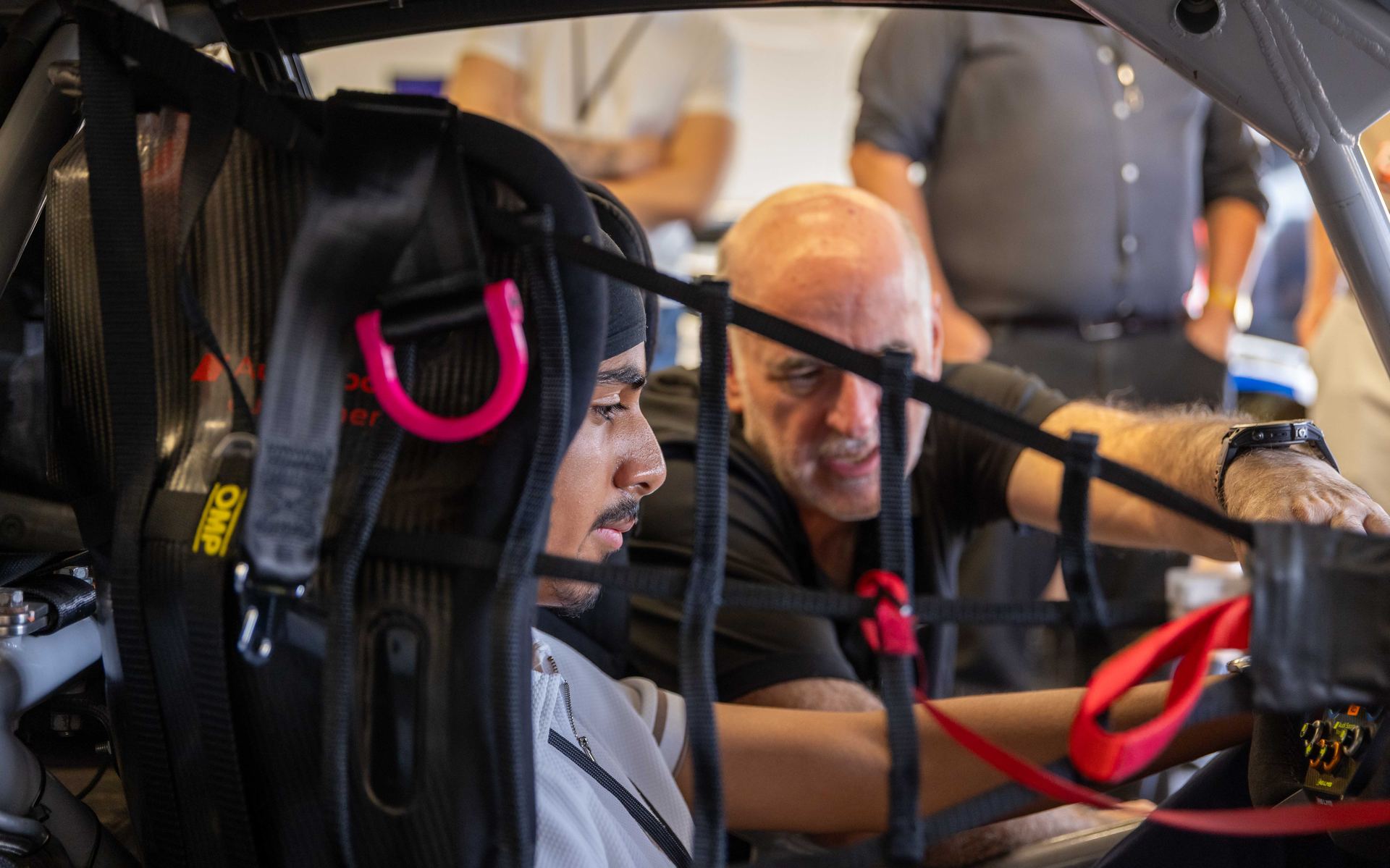 Fitting the driver harness before a session