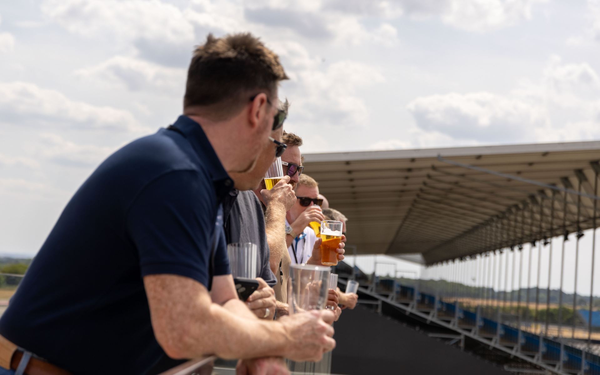 Guests on the hospitality balcony overlooking the circuit